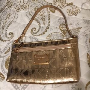 MK wristlet rose gold